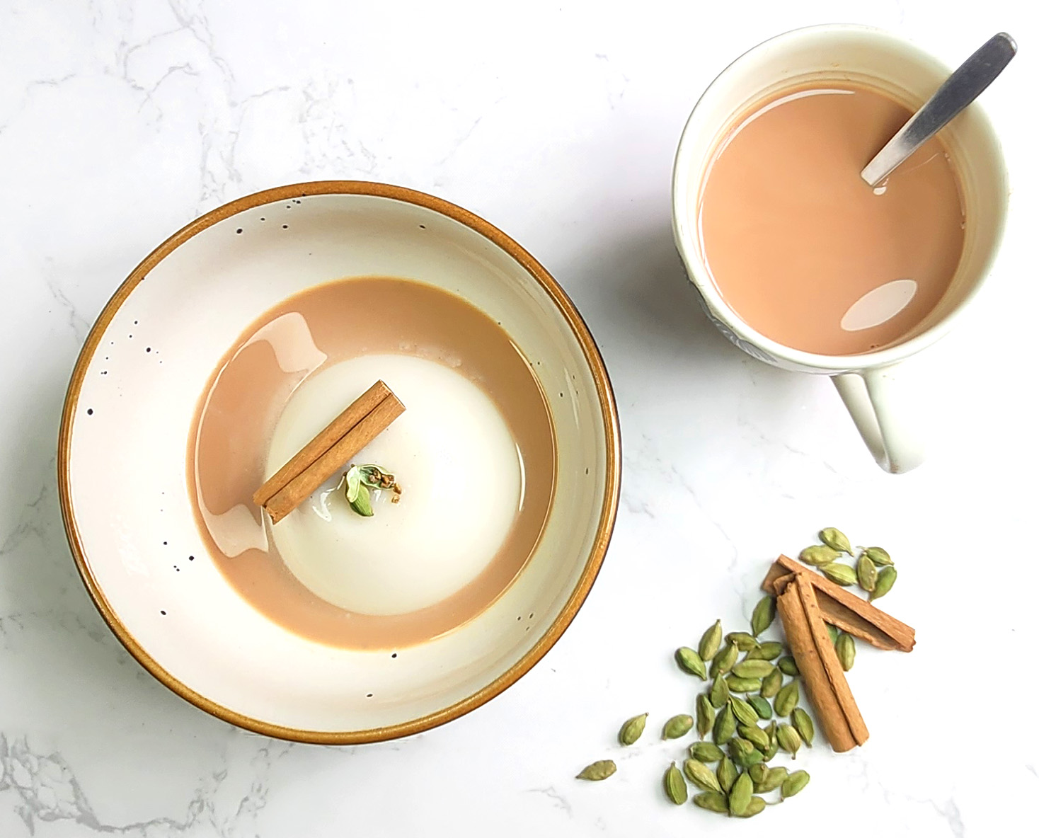 Vanilla Chai spiced pannacotta in a bowl with chai sauce