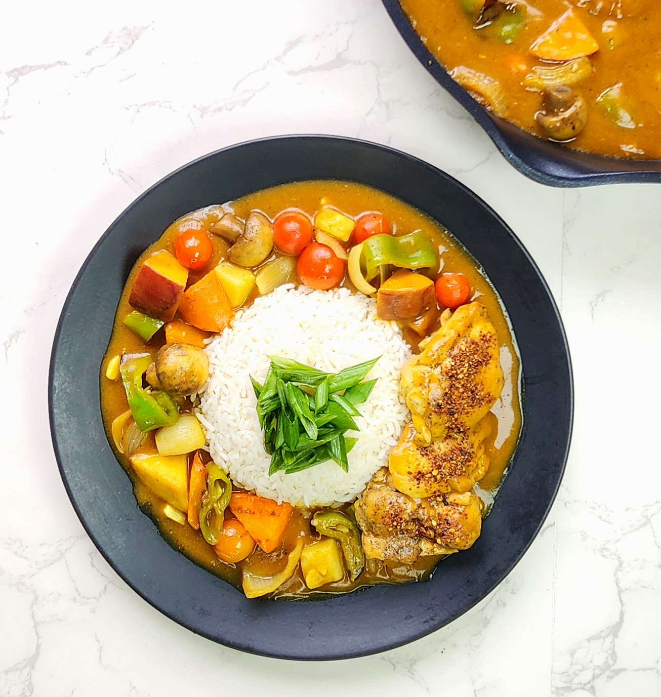 Quick Japanese Curry with chicken on a plate with sticky rice
