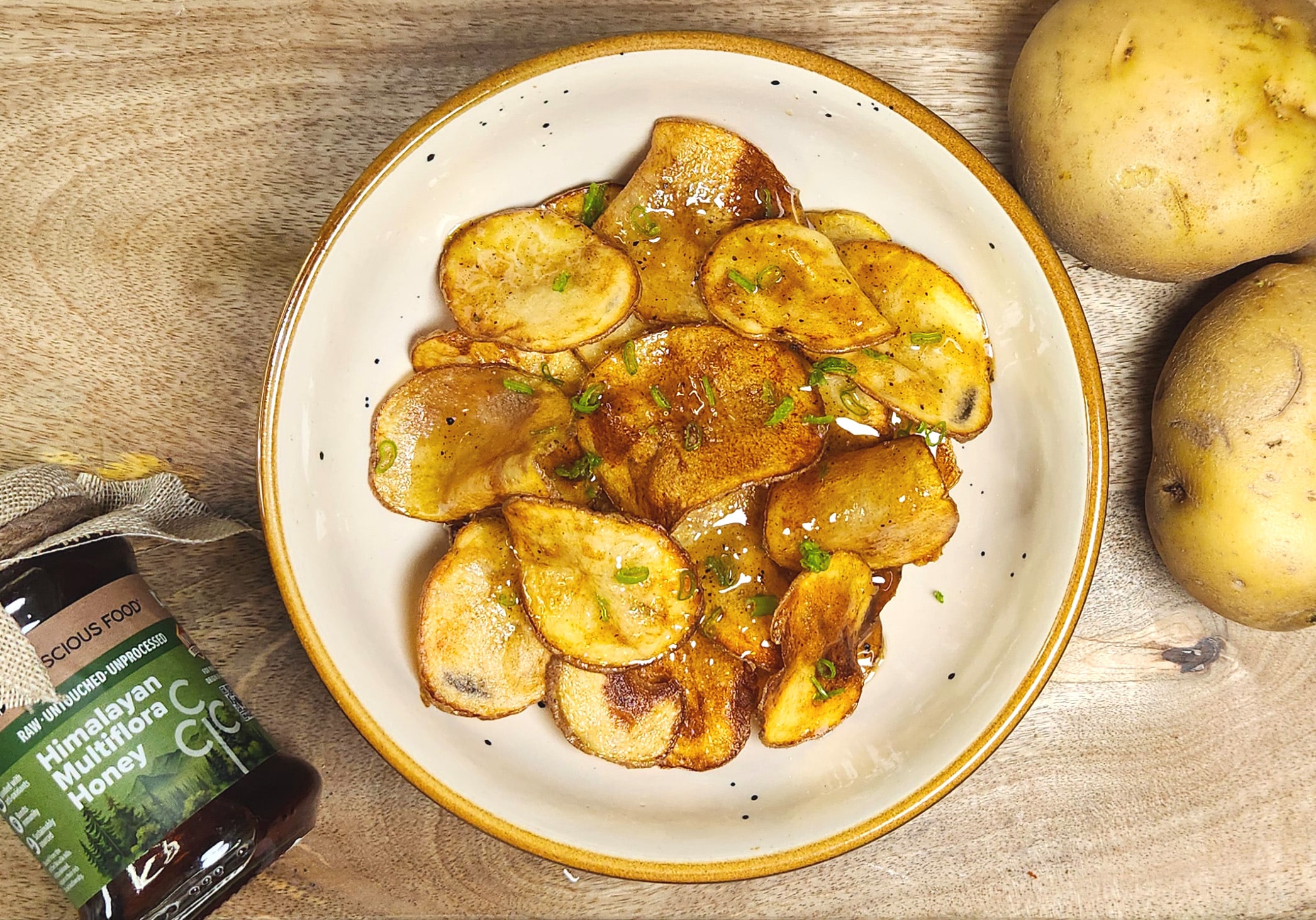 honey butter chips with potatoes, honey, butter, garlic, salt, spring onions and lime