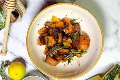 roast pumpkin with sage brown butter in a bowl